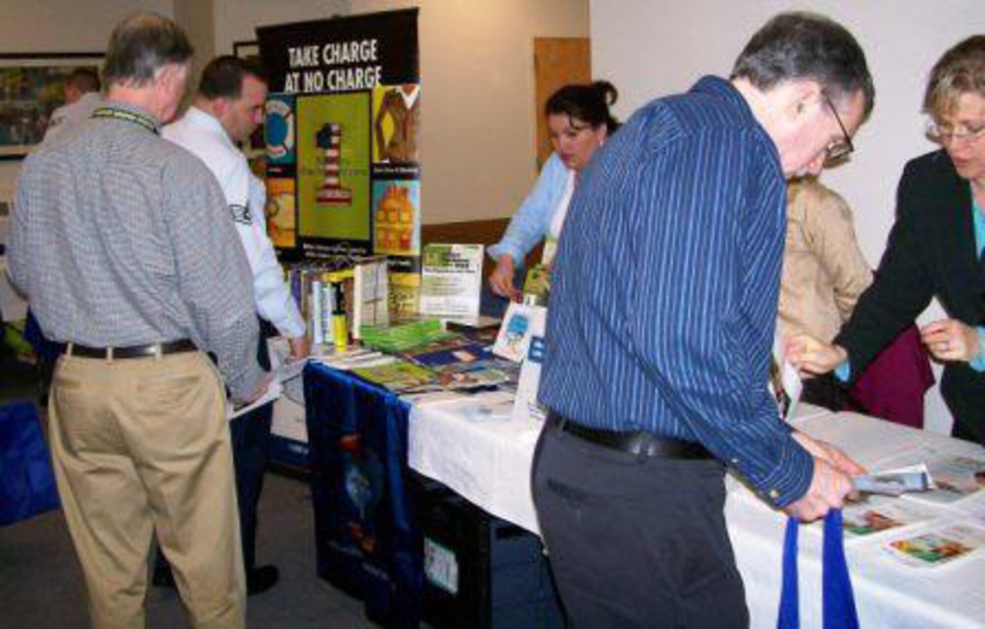 HANSCOM AIR FORCE BASE, Mass. - Newcomers learn more about the local area and available services from on and off-base agency representatives at the Information Fair at Installation Commander’s Welcome. (Courtesy photo)