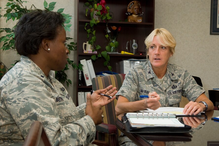 Lt. Col. Danielle Bernard (left), who leads Electronic Systems Center’s new Unit Support function, CSH, updates ESC Chief of Staff Col. Mary McRae on transition progress July 28.