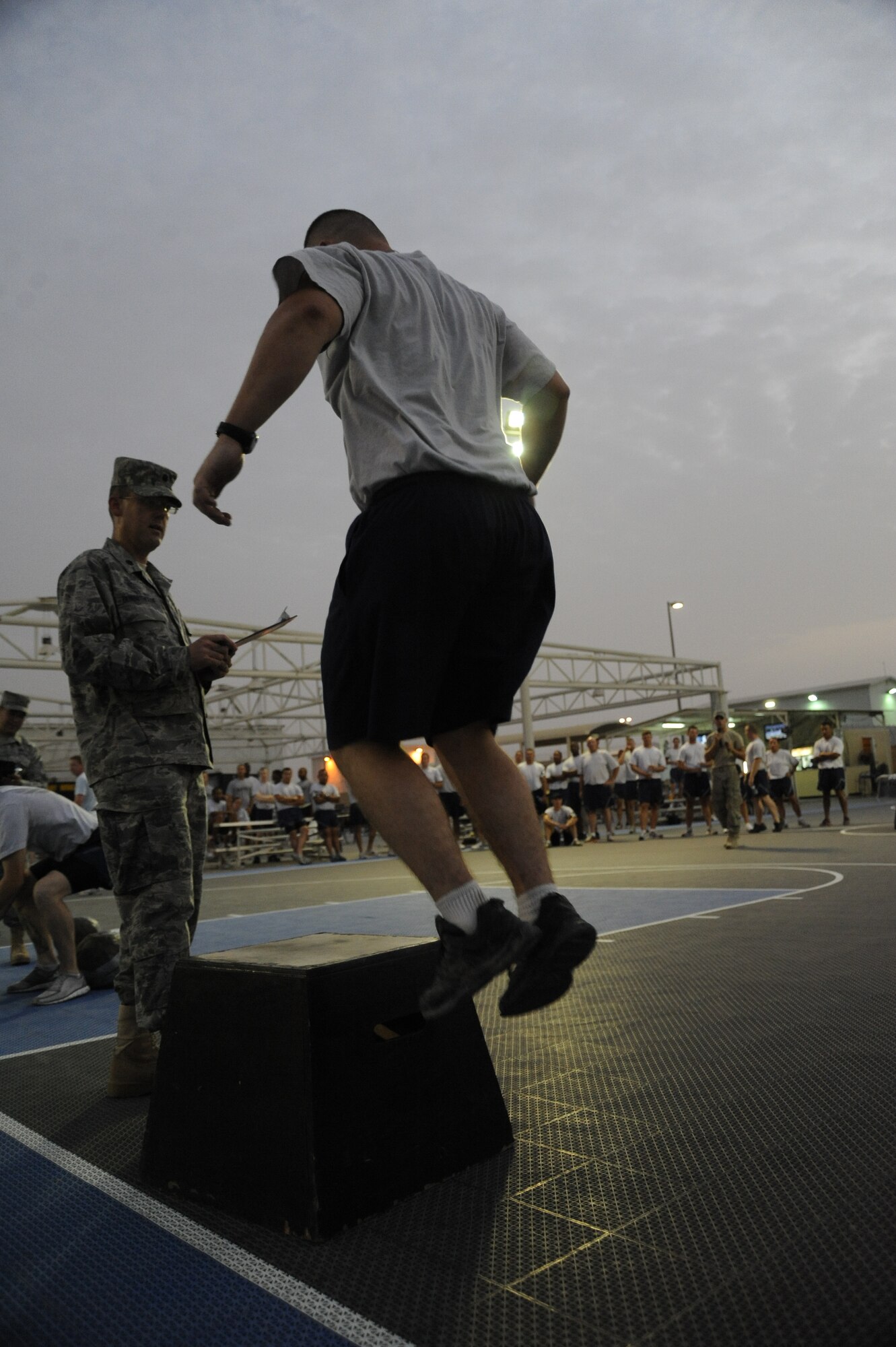 An Airman from the 380th Air Expeditionary Wing competes in the Fight Gone Bad Crossfit Challenge at an undisclosed location in Southwest Asia. (U.S. Air Force photo/ Staff Sgt. Thomas Kessler)       
