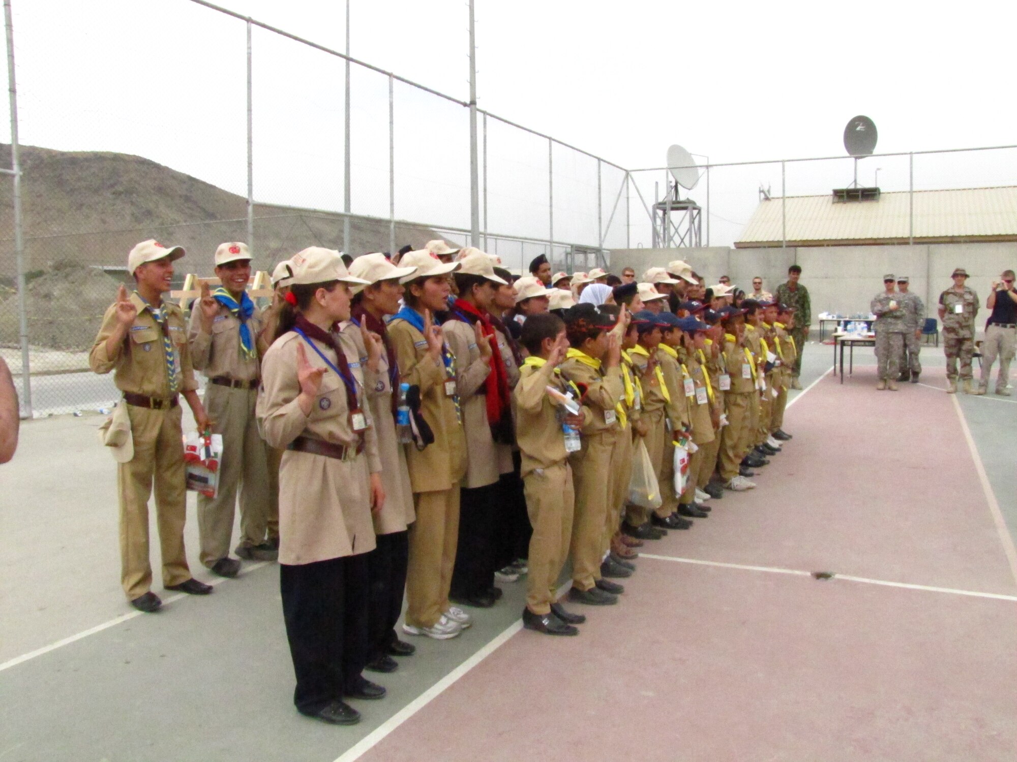 KABUL, Afghanistan - Members of the Afghan Scouts sing the Afghan National Anthem at the ISAF Joint Command base on Aug 1st, 2010. (U.S. Air Force photo by Capt. Rob Leese/RELEASED).
