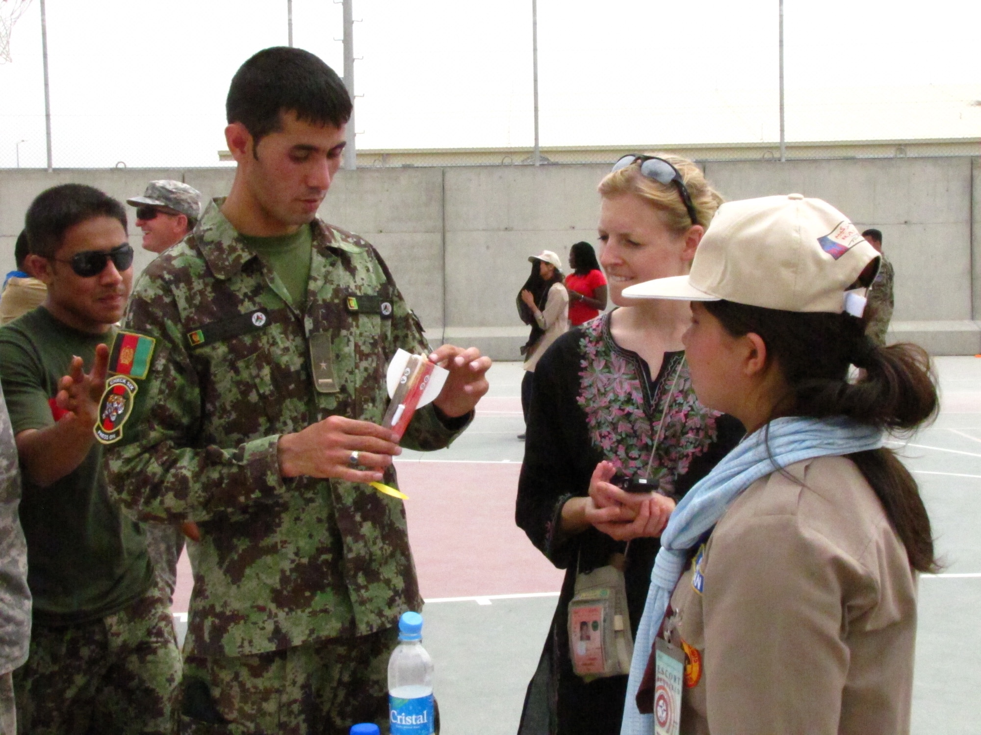 KABUL, Afghanistan - Members of the Afghan Scouts and Afghan Air Force Lieutenants build space rockets made of miniature balsa wood that are propelled by a rubber band and propeller along a taut fishing line on Aug 1st, 2010. (U.S. Air Force photo by Capt. Rob Leese/RELEASED).