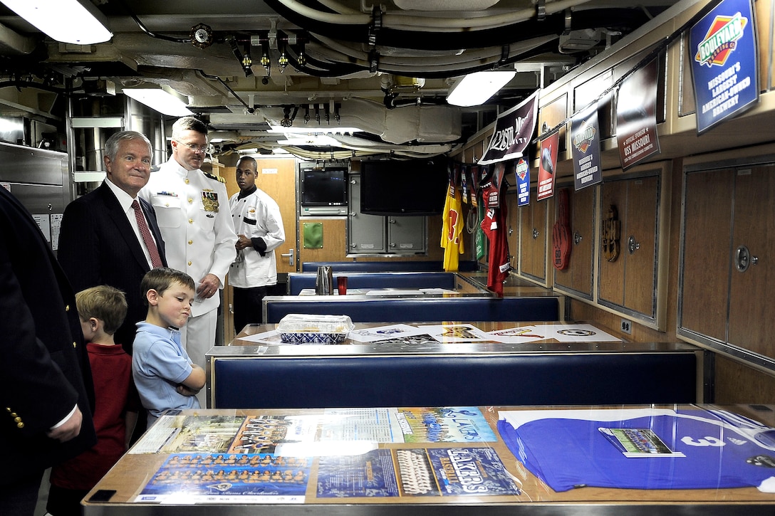 Defense Secretary Robert M. Gates receives a tour the commissioning ceremony for the Virginia-class attack submarine USS Missouri at Naval Submarine Base New London, in Groton, Conn., July 31, 2010.