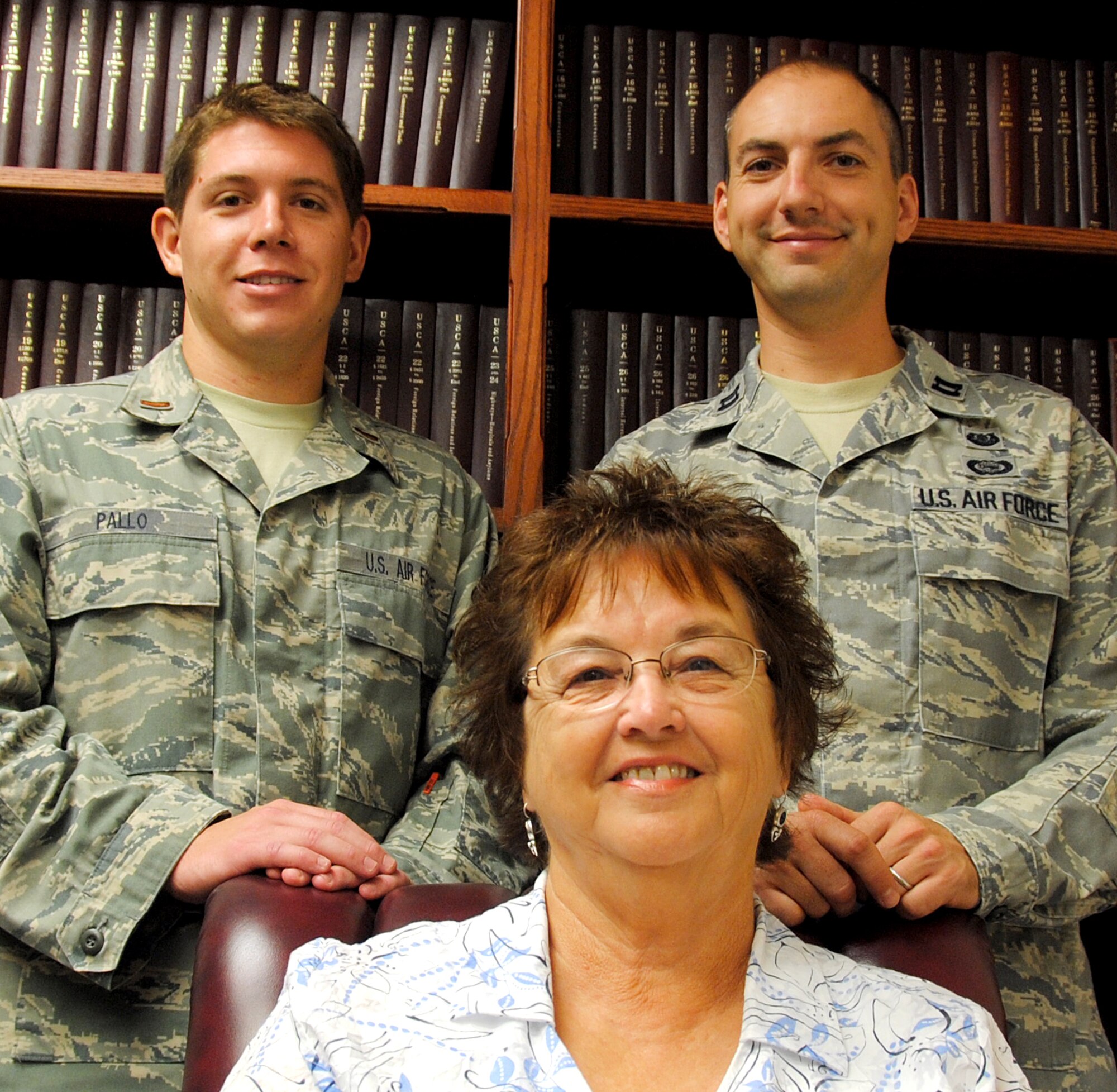 Jean Null, front row, 2nd Lt. Jason Pallo, back row left, and Capt. Jeff Biller, all with the 71st Flying Training Wing’s Staff Judge Advocate at Vance, are Warriors of the Week. (U.S. Air Force photo/ Joe B. Wiles)