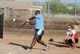 Staff Sgt. Charles Brown, 9th Intelligence Squadron, drives a ball deep to the outfield Aug. 2 against the 9th Security Forces Squadron. Sergeant Brown had three hits during the game helping the 9th IS to victory. (Photo by Senior Airman Chuck Broadway)