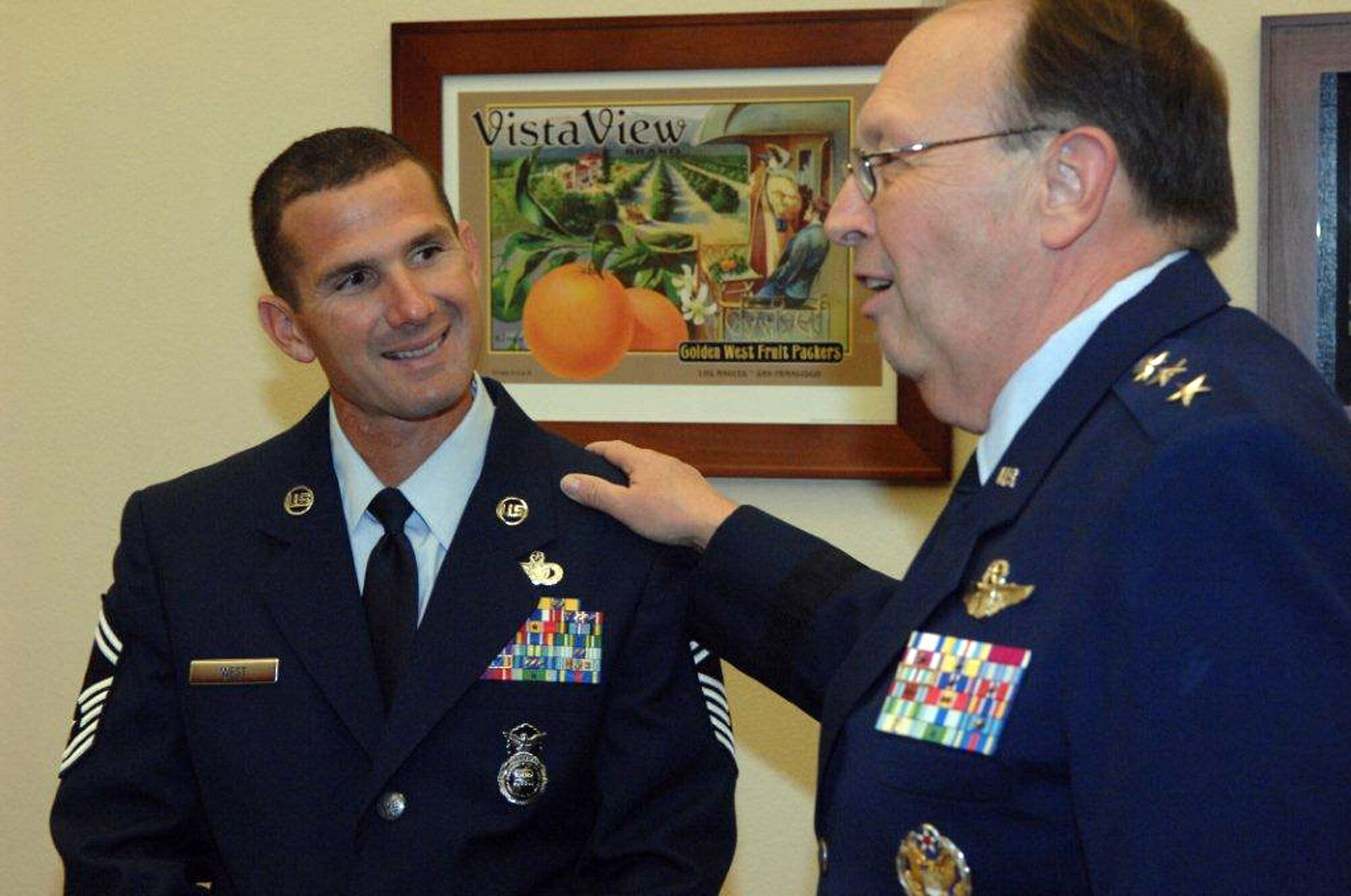TRAVIS AIR FORCE BASE, Calif.  Lt. Gen. Charles E. Stenner Jr., chief of the Air Force Reserve and the commander for the Air Force Reserve Command, was in Riverside on July 22 for the 12th annual Raincross Trophy Dinner and is shown here talking to Senior Master Sgt. Steven S. West, 349th Security Forces Squadron.  Sergeant West was named the winner of the Air Force Reserve Command Outstanding SNCO of the Year. (U.S. Air Force photo/Tech. Sgt. Meredith Mingledorff) 
