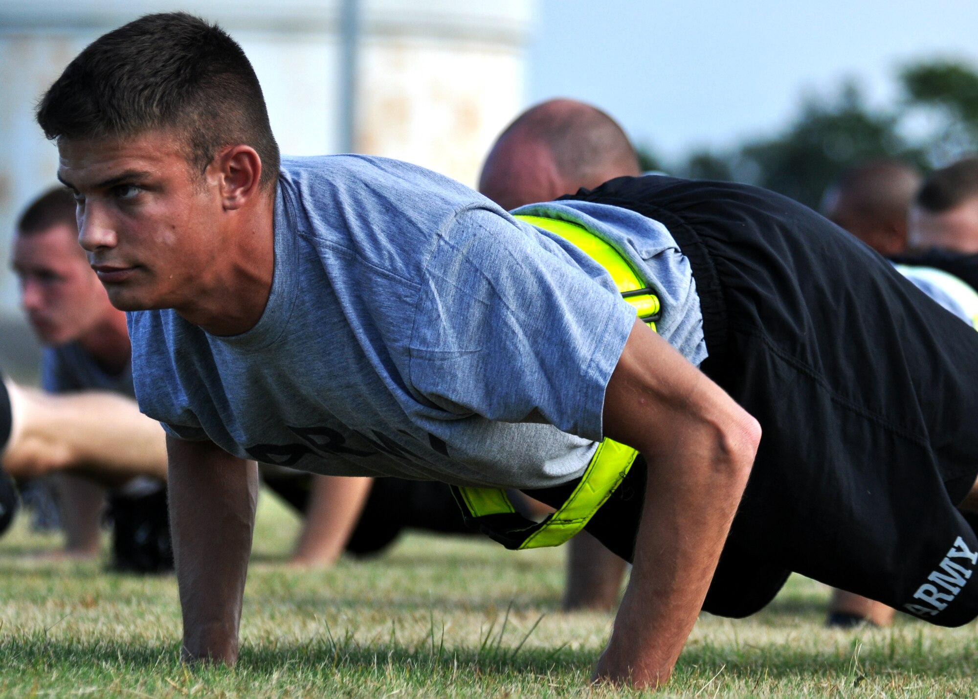 Pvt. Michael Mercy performs push-ups during an afternoon physical training session at Eglin Air Force Base, Fla.  The 450 members of Bravo Company exercise four days a week after EOD classes end.  Combined with Alpha Company, there are approximately 750 Soldiers in stages of training at the 35-week Navy EOD course located at Eglin.  (U.S. Air Force photo/Tech Sgt. Cheryl Foster.) 