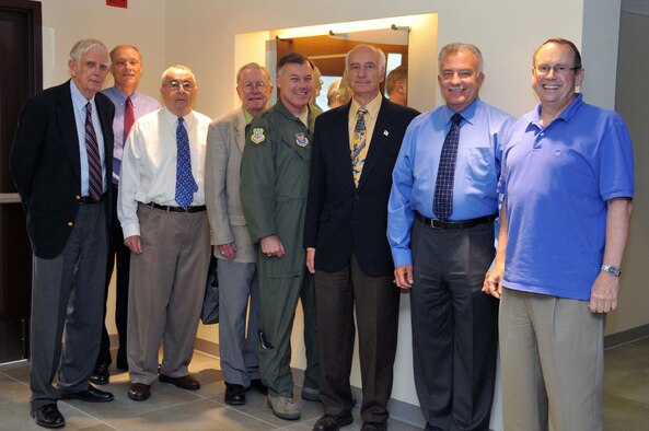 The Air Force Operational Test and Evaluation Center hosted members of the Kirtland Partnership Committee July 23. From left, Bill Keleher, David Seely, Stuart Purviance, Chuck Lanier, AFOTEC Commander Maj. Gen. Stephen T. Sargeant, Charlie Thomas, Mike Chase, and Gary Van Valin.  U.S. Air Force Photo by George Diamond.