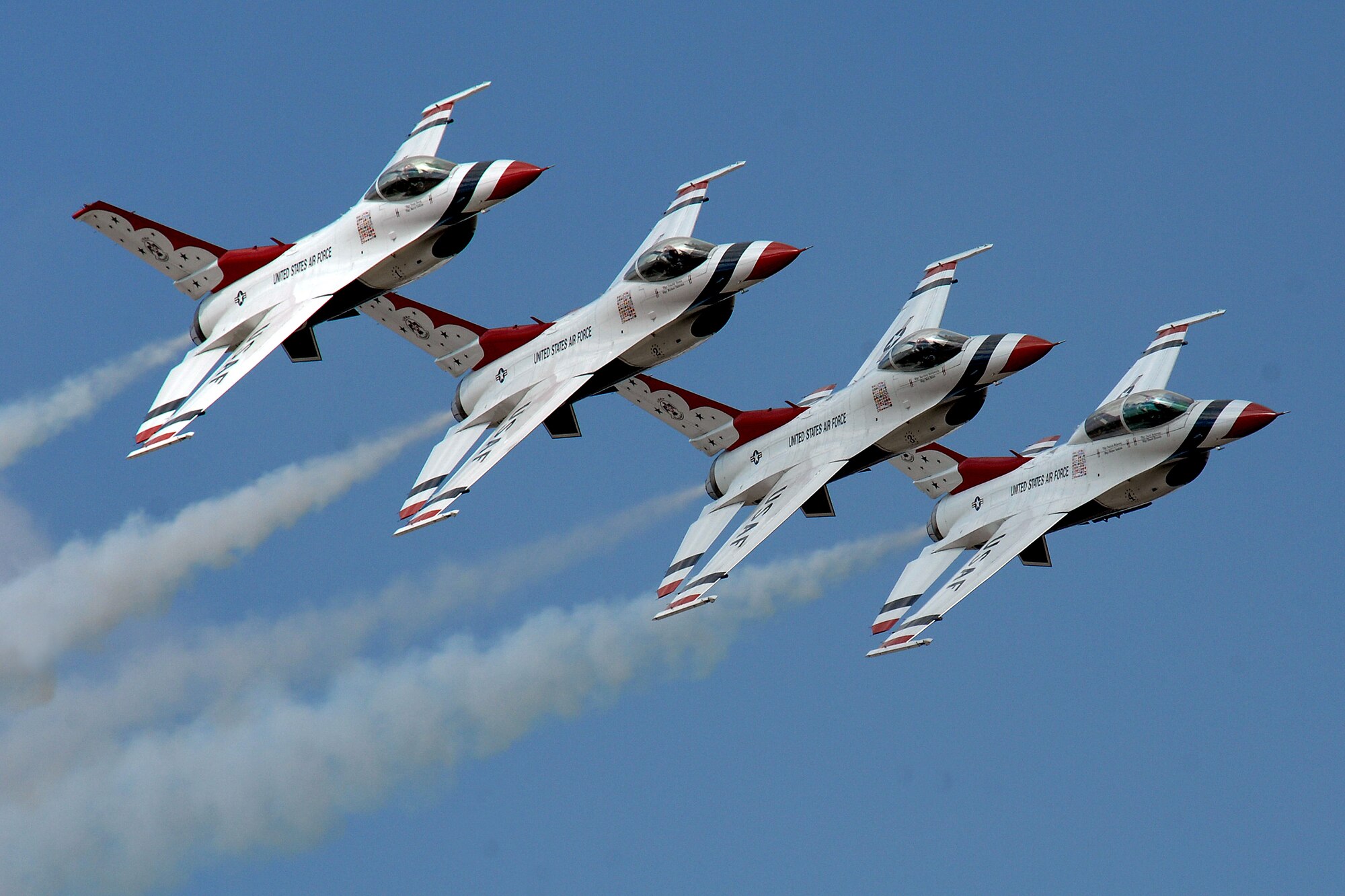 OFFUTT AIR FORCE BASE, Neb. - The U.S. Air Force Thunderbirds demonstration team perform an aerial show at 2008's Air Force Week in the Heartland. The Thunderbirds will be here again Aug. 28 - 29 for the 2010 Defenders of Freedom Open House and Air Show on base. The event is free and open to the public. For more information about this and other performers, visit www.offuttairshow.com. The Thunderbird team is made up of more than 120 personnel who represent all Airmen across the globe. The primary Thunderbird mission is to represent the Pride, Precision and Professionalism all Airmen demonstrate. From the ground show to the breathtaking aerial maneuvers, the Thunderbirds continue to represent America's Airmen. U.S. Air Force photo by Josh Plueger

