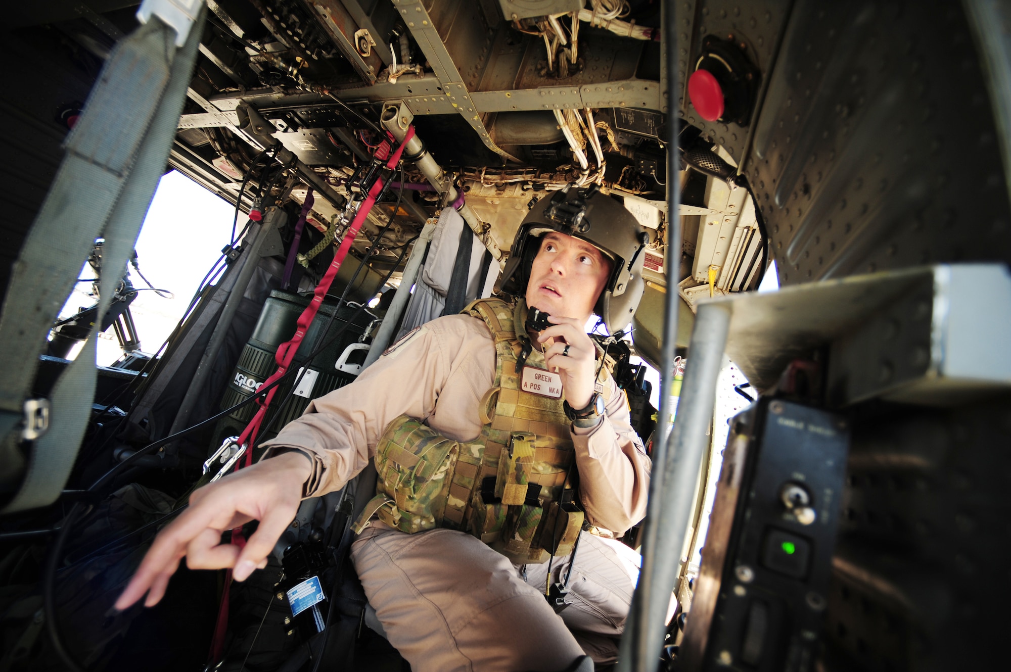 DAVIS-MONTHAN AIR FORCE BASE, Ariz -- Staff Sgt. Andrew Green performs a preflight checklist during Angel Thunder 2010, April 15, 2010.  Angel Thunder 2010, an Air Combat Command sponsored exercise, will be the largest personnel recovery and combat search and rescue exercise to date, combining Department of Defense and non-DOD assets.  (U.S. Air Force photo/Staff Sgt. Joshua L. DeMotts) 