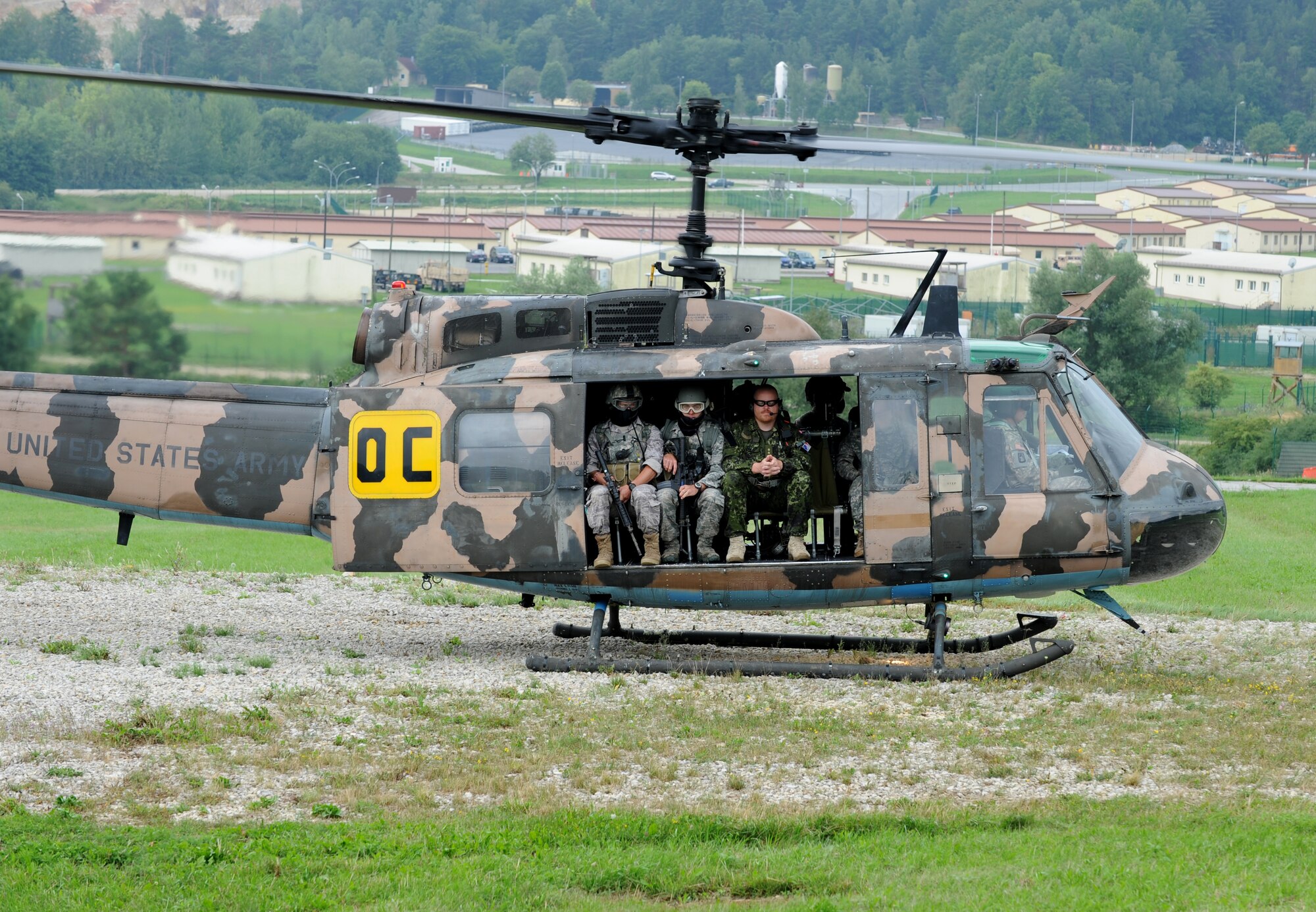 U.S. Air Force, Army and North Atlantic Treaty Organization's (NATO) members prepare to take off for an air assault mission scenario during exercise ALLIED STRIKE 10, Hohenfels, Germany, Aug. 3, 2010. AS 10 is Europe's premier close air support (CAS) exercise, held annually to conduct robust, realistic CAS training that helps build partnership capacity among allied NATO nations and joint services while refining the latest operational CAS tactics. For more ALLIED STRIKE information go to www.usafe.af.mil/alliedstrike.asp. (U.S. Air Force photo by Senior Airman Caleb Pierce)
