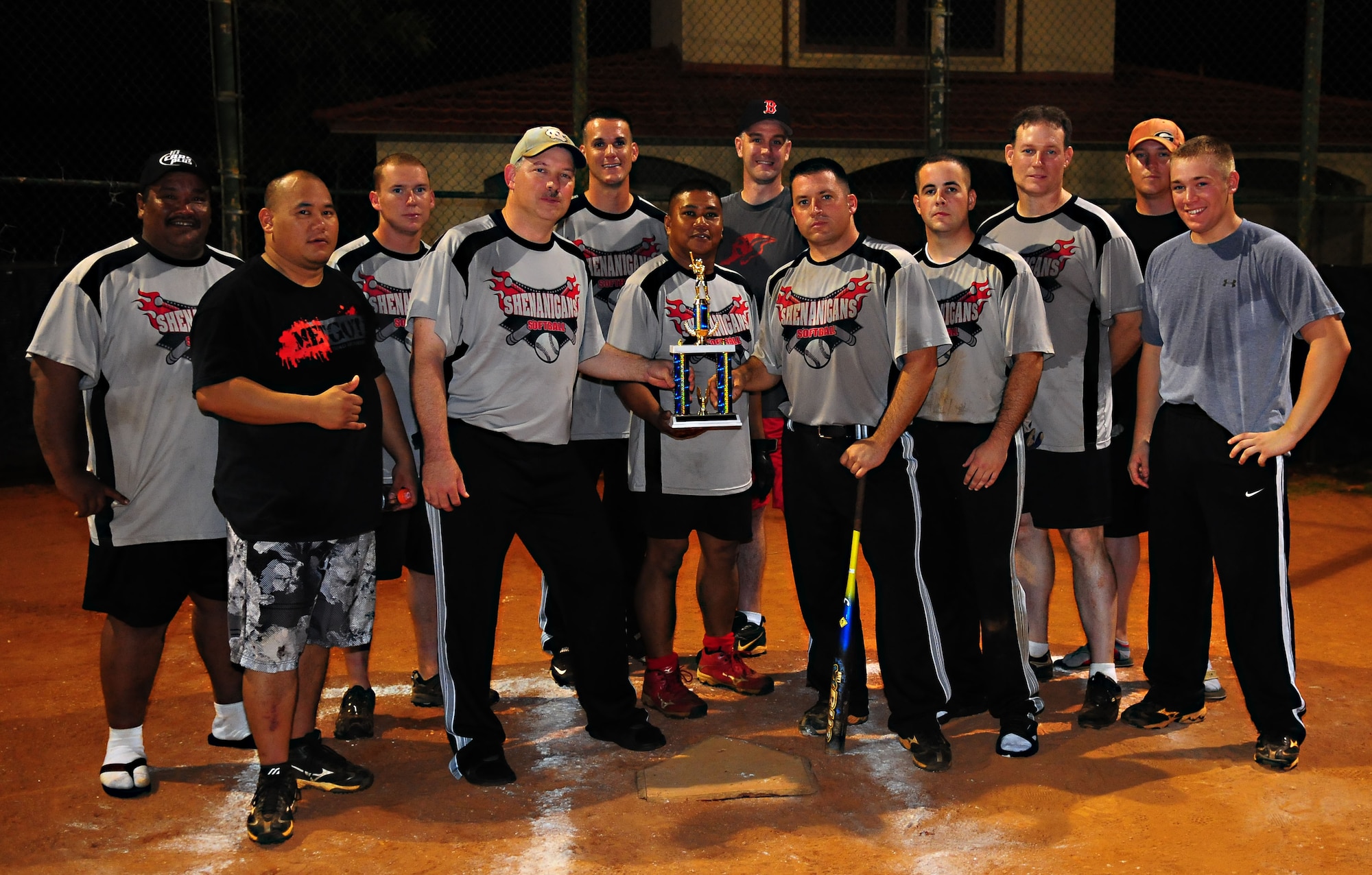ANDERSEN AIR FORCE BASE, Guam ? Members of the 36th Logistical Readiness Squadron softball team pose with their trophy after winning second place in the base intramural softball championship game here Aug 2. Members of the team are:  Randy Treltas, Tech. Sgt. Dann Rabideau, Master Sgt. Danny Turner, Senior Airman Bill Judge, Chief Master Sgt. Herbert Welday, Pat Fejeran, Master  Sgt. Shawn Tolar, Airman 1st Class William White, Airman 1st Class Chris Walt, Master Sgt. Ronnie Hancock, Maj. David Wall, Master Sgt. Brian Hinson, Tony Quiambao, and Jeff Crandell. (U.S. Air Force photo by Airman Julian North)     