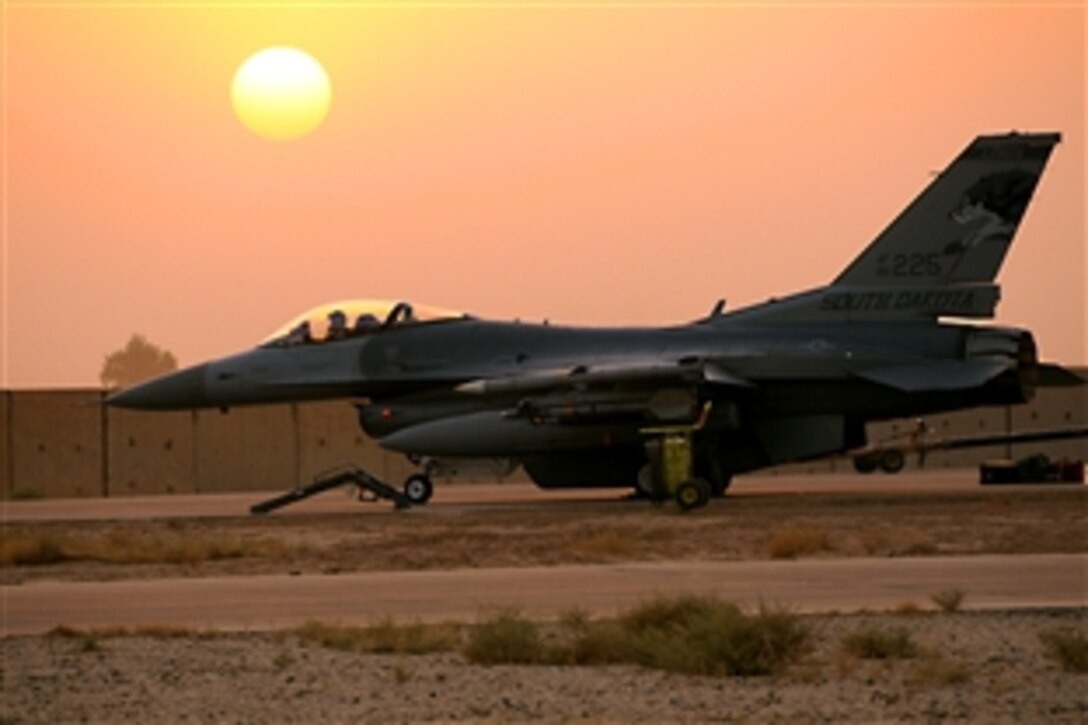 U.S. Air Force Lt. Col. Nicholas Gentile prepares to launch an F-16 Fighting Falcon aircraft on Joint Base Balad, Iraq, July 31, 2010. Gentile is a fighter pilot assigned to the 169th Fighter Wing out of McEntire Joint National Guard Base, S.C.
