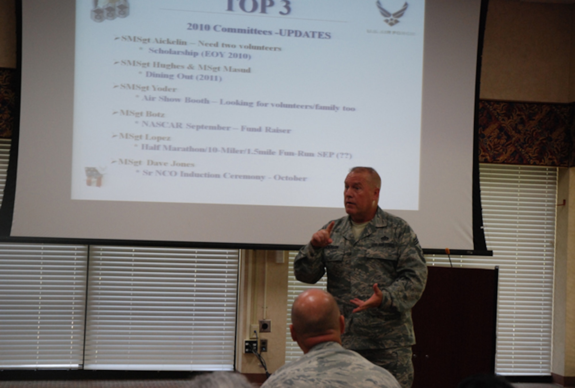 Command Chief Master Sgt. John Anderson discusses upcoming Dobbins initiatives in which the Dobbins Top 3 will play a key role during their meeting July 11. (U.S. Air Force photo/Master Sgt. James Branch)