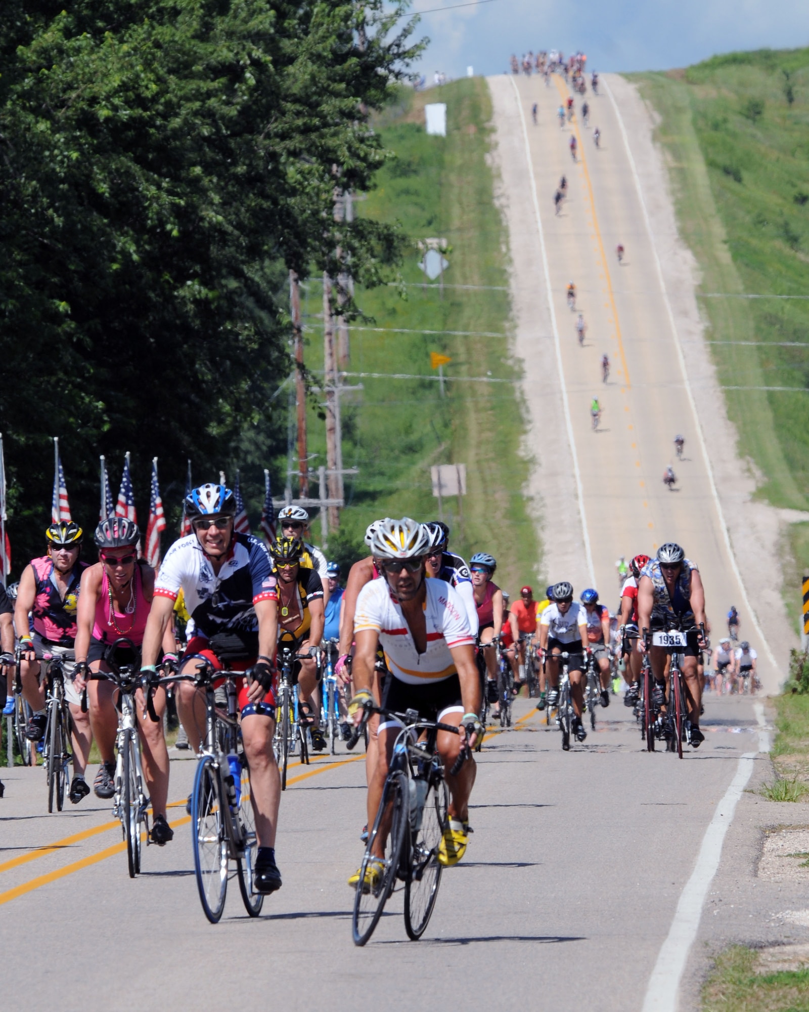Members of the Air Force Cycling Team roll into Washta, Iowa, July 25, 2010 during the Register's Annual Great Bicycle Ride Across Iowa, also known as RAGBRAI.  More than 160 Airmen came to join 10,000 other riders from around the country in the 38th annual bicycle trip across the state of Iowa from the Missouri River in the west, to the Mississippi River in the east. (U.S. Air Force photo)