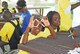 As part of arts and crafts activities at Camp Sunshine, Caleb Spell, 8, left, and Damon Harris, 8, work on god’s eyes at a pavilion near the base lakes. (U.S. Air Force/Kimberly L. Wright)