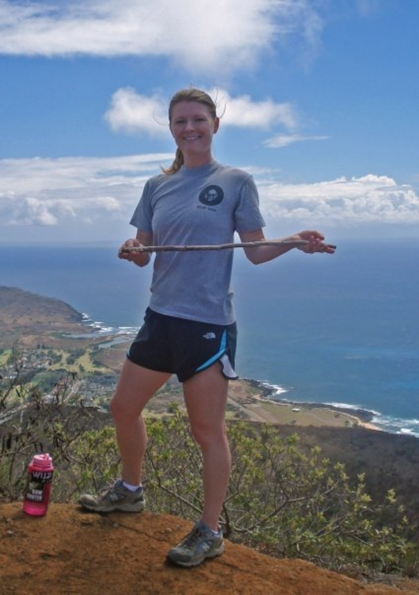 Staff Sgt. Cheryl Moore, from the 8th Intelligence Squadron at Joint Base Pearl Harbor-Hickam, Hawaii races to the top of a popular Hawaiian hike trail. Pictured behind her is the beautiful coastline of Oahu. (Courtesy photo)

