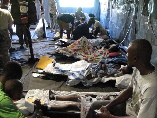 Patients await transport at the Mobile Aeromedical Staging Facility at Port-au-Prince International Airport in Haiti. (U.S. Air Force photo/unknown)