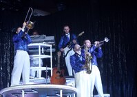 Tops in Blue performs in front of a capacity crowd at the Bob Hope Performing Arts Center July 28. Known as the Air Forces' Expeditionary Entertainers; the group's main mission is to perform for military personnel and their families throughout the world. (U.S. Air Force photo/Robbin Cresswell)