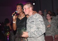 A member of the Air Force Tops in Blue entertainment group interacts with the crowd July 28 at the Bob Hope Performing Arts Center. The group has been entertaining audiences across the country and around the world for more than 50 years. (U.S. Air Force photo/Robbin Cresswell)