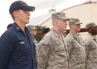 Boatswain's Mate 3rd Class Michael Tyrrell stands at attention during an Airman Leadership School Retreat ceremony July 22. Petty Officer Tyrrell is one of two Coast Guard students who graduated from ALS Aug. 4. (U.S. Air Force photo/Robbin Cresswell)