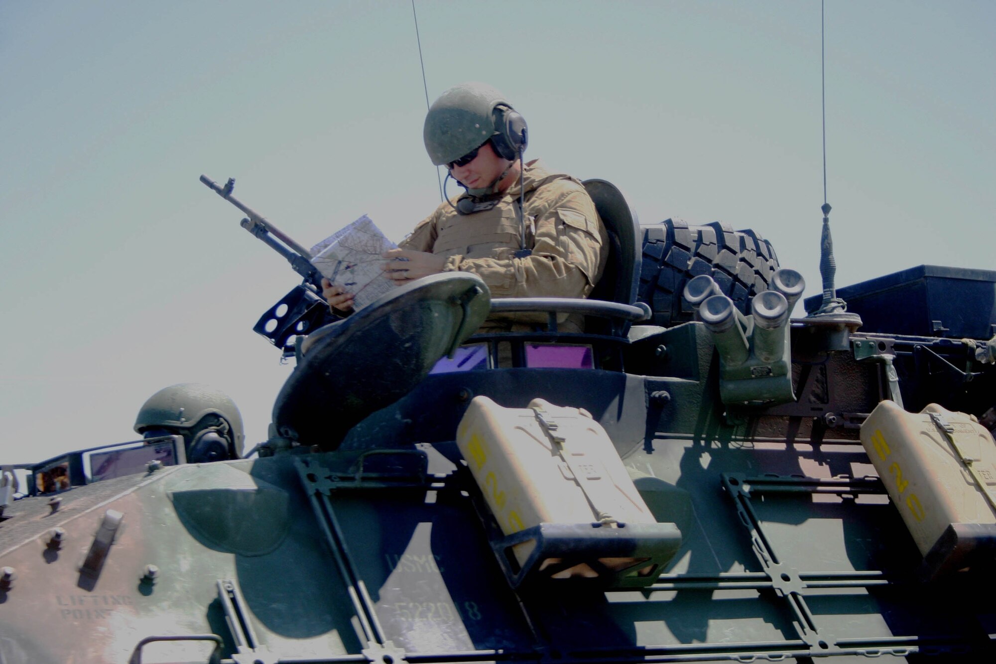 Marines prepare to move to their designated battle position during a Spartan Resolve exercise in California.  (Casey Bain, JFIIT, USJFCOM)