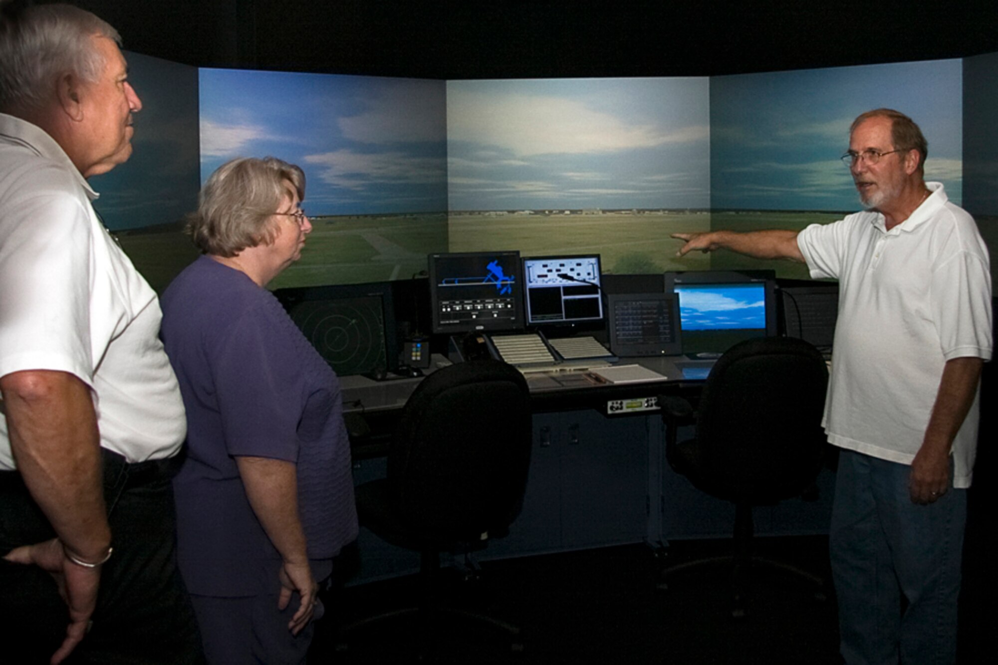 GRISSOM AIR RESERVE BASE, Ind. -- Terry Albaugh, 434th Operations Support Squadron air traffic manager, shows Joe Oyler and Tresa Baker an air traffic control simulator during an elected officials outreach event here recently. Mr. Oyler is a military affairs specialist for Congressman Steve Buyer and Mrs. Baker is a special assistant to Congressman Dan Burton. (U.S. Air Force photo/Tech. Sgt. Mark Orders-Woempner)