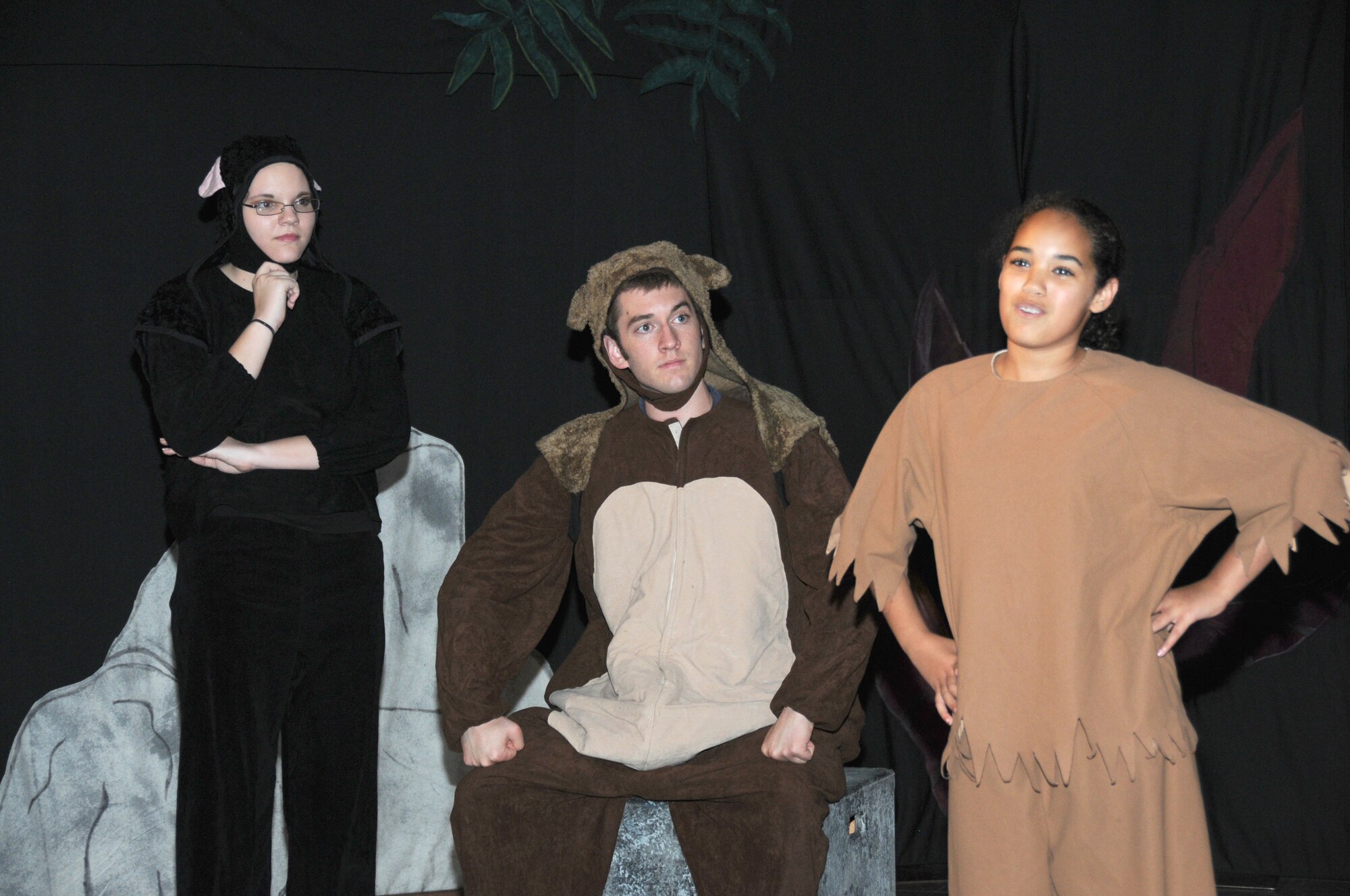 From left, Kaylee Hamann, Tyler Stamm and Britney Cheney rehearse for Friday’s presentation of “Jungle Book” by the Missoula Children’s Theater.  Kaylee, 14, is the daughter of Capt. Ronald Hamann, 333rd Training Squadron.  Britney, 12, is the daughter of Tech. Sgt. Alisha Baxter, 81st Medical Operations Squadron, and Staff Sgt. Michael Baxter, 335th TRS.  Mr. Stamm served as tour director with Jonathan Brantley for the week-long camp conducted by the theater.  Fifty-eight young people from the youth center performed in the play and another 150 were in the audience for Friday’s performance.  (U.S. Air Force photo by Kemberly Groue)