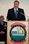 Secretary of the Air Force Michael B. Donley speaks to the audience attending the groundbreaking ceremony May 1, 2010 for the future Fisher House at Dover Air Force Base, Del. The Secretary co-hosted the ceremony with Air Force Chief of Staff Gen. Norton Schwartz and Kenneth Fisher, chairman of the Fisher House Foundation board of trustees. When construction is completed, this Fisher House will be the first Fisher House to provide hospice services to family members awaiting the return of their fallen heroes from overseas. (U.S. Air Force photo/Roland Balik)

