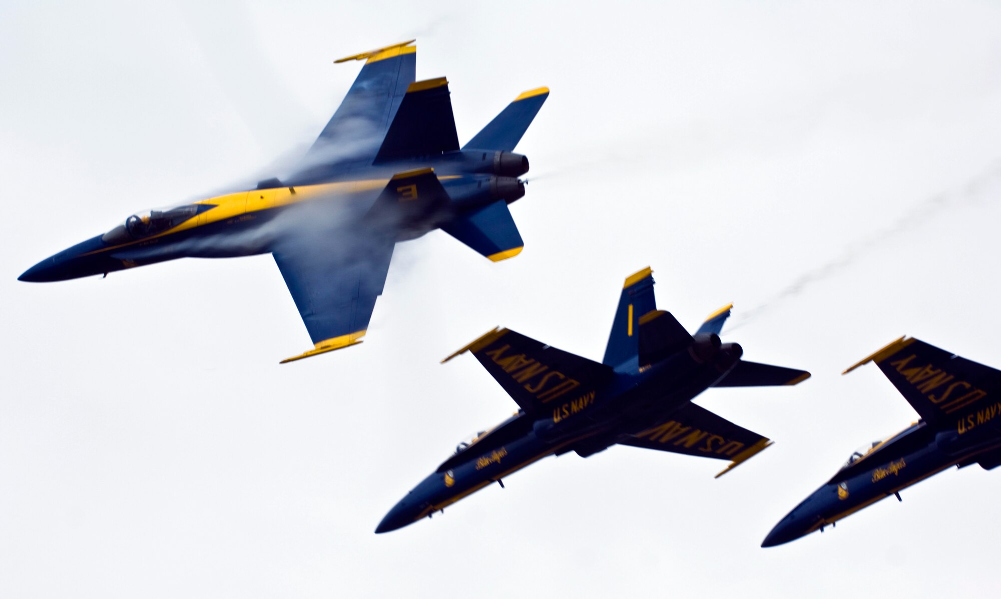 JOINT BASE ELMENDORF-RICHARDSON, Alaska -- A Boeing F/A-18 Hornet from the U.S. Navy Blue Angels peels off during Arctic Thunder at Joint Base Elmendorf-Richardson Aug. 1. Arctic Thunder 2010, a two-day event, featured the Blue Angels and the Canadian Forces Snowbirds Demonstration Team, along with many other aerial demonstrations and static displays. (Air Force photo by Airman 1st Class Christopher Gross) 