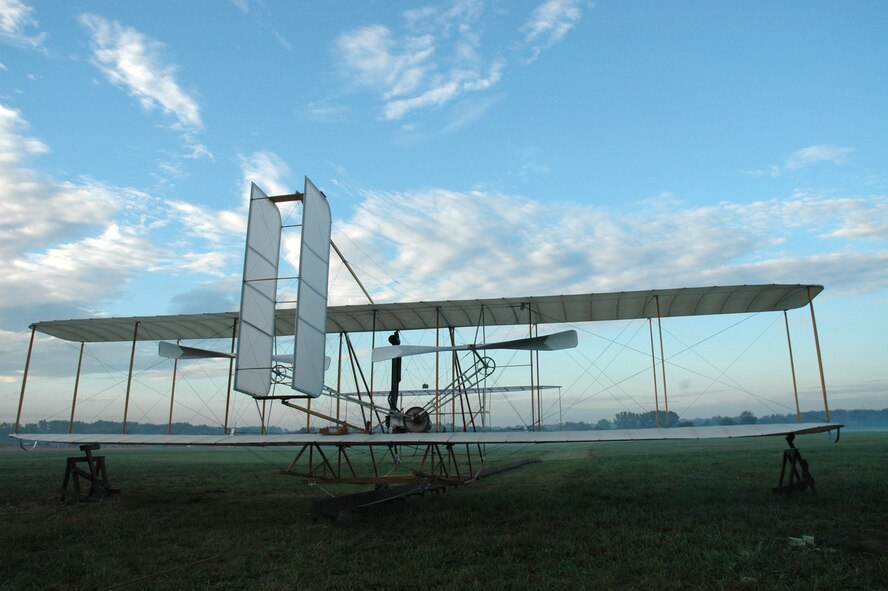 A 1905 Wright Flyer III replica overlooks Huffman Prairie Flying Field at Wright-Patterson Air Force Base, Ohio in this file image. The Dayton Aviation Heritage National Historical Park will host an Aero Carnival Aug. 21, 2010 at the historic prairie. The family-oriented event is free and open to the general public and celebrates the rich history of the Wright Brothers' activities at the prairie a century earlier. (Photo Courtesy National Park Service)