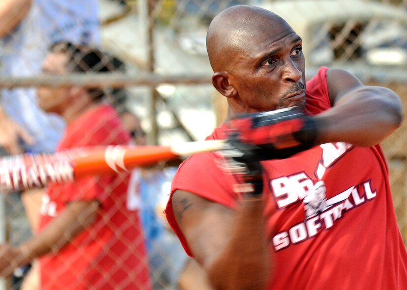 The 96th Medical Group pitcher, Rob Taylor, swings for the fences during the base intramural softball championship Aug. 2 at Eglin’s Foster Stadium.  The 96th Logistics Readiness Squadron team came up from the losers’ bracket to defeat MDG twice to claim the title in the double elimination tournament.  Taylor had two home runs for MDG during the games.  Both games were won by only one run, which was scored in the bottom of the final inning.  (U.S. Air Force photo/Tech. Sgt. Cheryl Foster.)