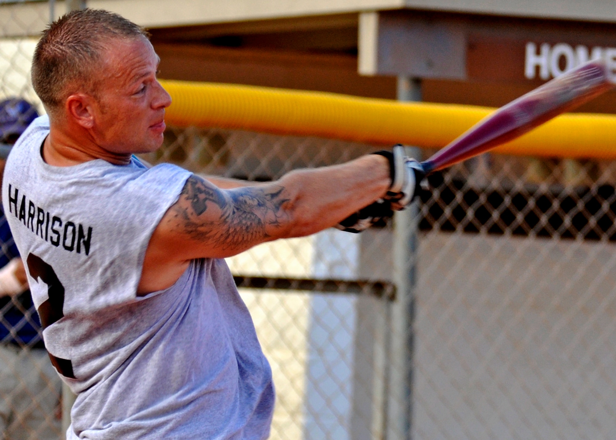 Rob Harrison, 96th Logistics Readiness Squadron, swings for the fences during the base intramural softball championship Aug. 2 at Eglin’s Foster Stadium.  The 96th Logistics Readiness Squadron team came up from the losers’ bracket to defeat MDG twice to claim the title in the double elimination tournament.  Both games were won by only one run, which was scored in the bottom of the final inning.  (U.S. Air Force photo/Tech. Sgt. Cheryl Foster.)