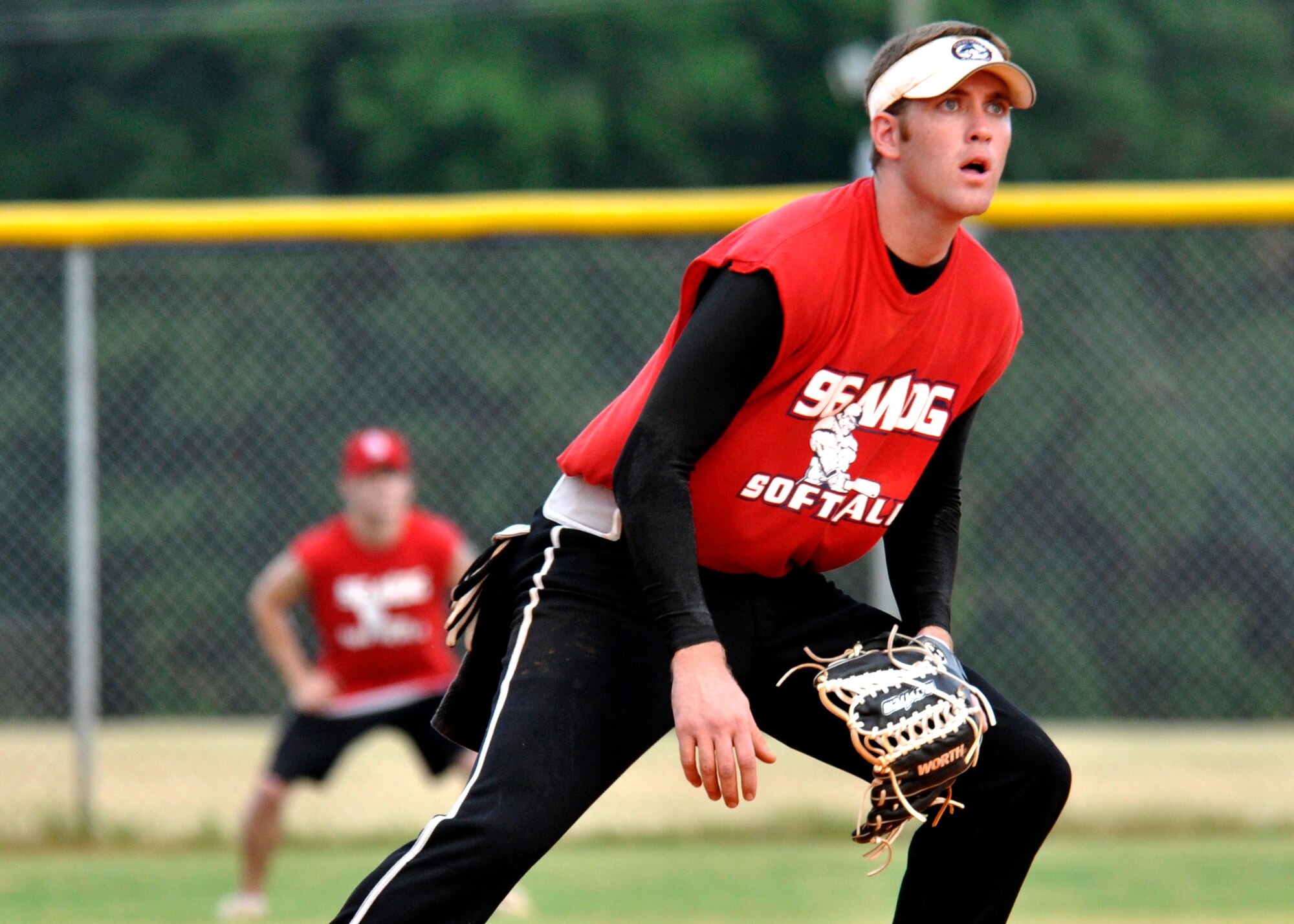 The 96th Medical Group shortstop, Philip Parrish, anticipates a hit during the base intramural softball championship Aug. 2 at Eglin’s Foster Stadium.  The 96th Logistics Readiness Squadron team came up from the losers’ bracket to defeat MDG twice to claim the title in the double elimination tournament.  Taylor had two home runs for MDG during the games.  Both games were won by only one run, which was scored in the bottom of the final inning.  (U.S. Air Force photo/Tech. Sgt. Cheryl Foster.)