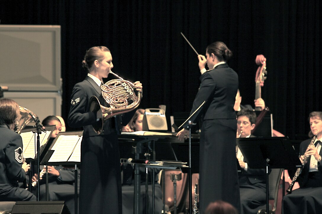 Senior Airman Melissa Crews performs with the Concert Band at the 2010 Texas Bandmasters Association Convention performance.