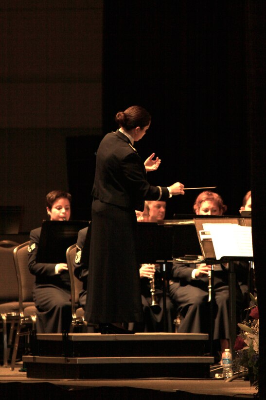 Captian Cristina Moore Urrutia conducts the Concert Band at the 2010 Texas Bandmasters Association Convention performance