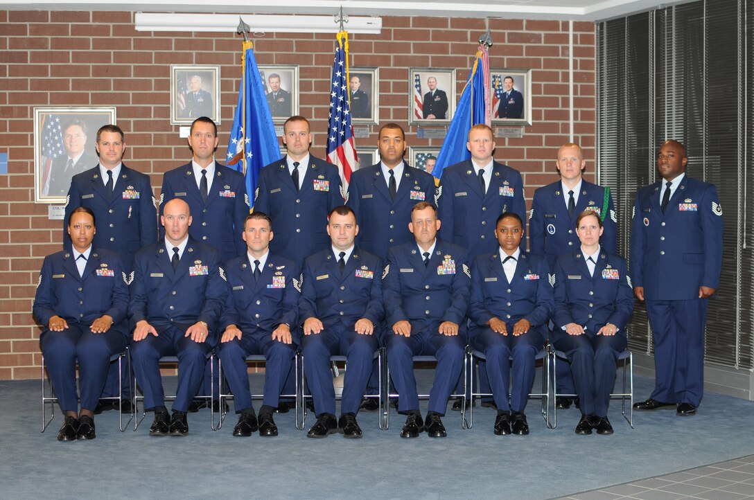 McGHEE TYSON AIR NATIONAL GUARD BASE, Tenn. -- NCO Academy Class 10-7, A-Flight, gathers at The I.G. Brown Air National Guard Training and Education Center here, July 16, 2010. Pictured (L-R sitting) are Tech. Sgt. Danita A. Tyson;  Tech. Sgt. Shawn T. Conder;  Tech. Sgt. Jeffrey B. Witherly;  Tech. Sgt. Jessie J. Frye;  Tech. Sgt. Richard R. Weis;  Tech. Sgt. Dionna C. Payne;  Tech. Sgt. Jessica E. Hildebrand; (L-R standing) Tech. Sgt. Ronnie K. Parker, III; Tech. Sgt. Paul R. Eaton, Jr.; Tech. Sgt. Joseph D. Brenner;  Tech. Sgt. Ashanti L. Hairston;  Tech. Sgt. Mitchell A. Walker;  Tech. Sgt. Stephen W. Hudson;  and Tech. Sgt. Moe Greenidge, instructor. (U.S. Air Force photo by Master Sgt. Kurt Skoglund/Released)