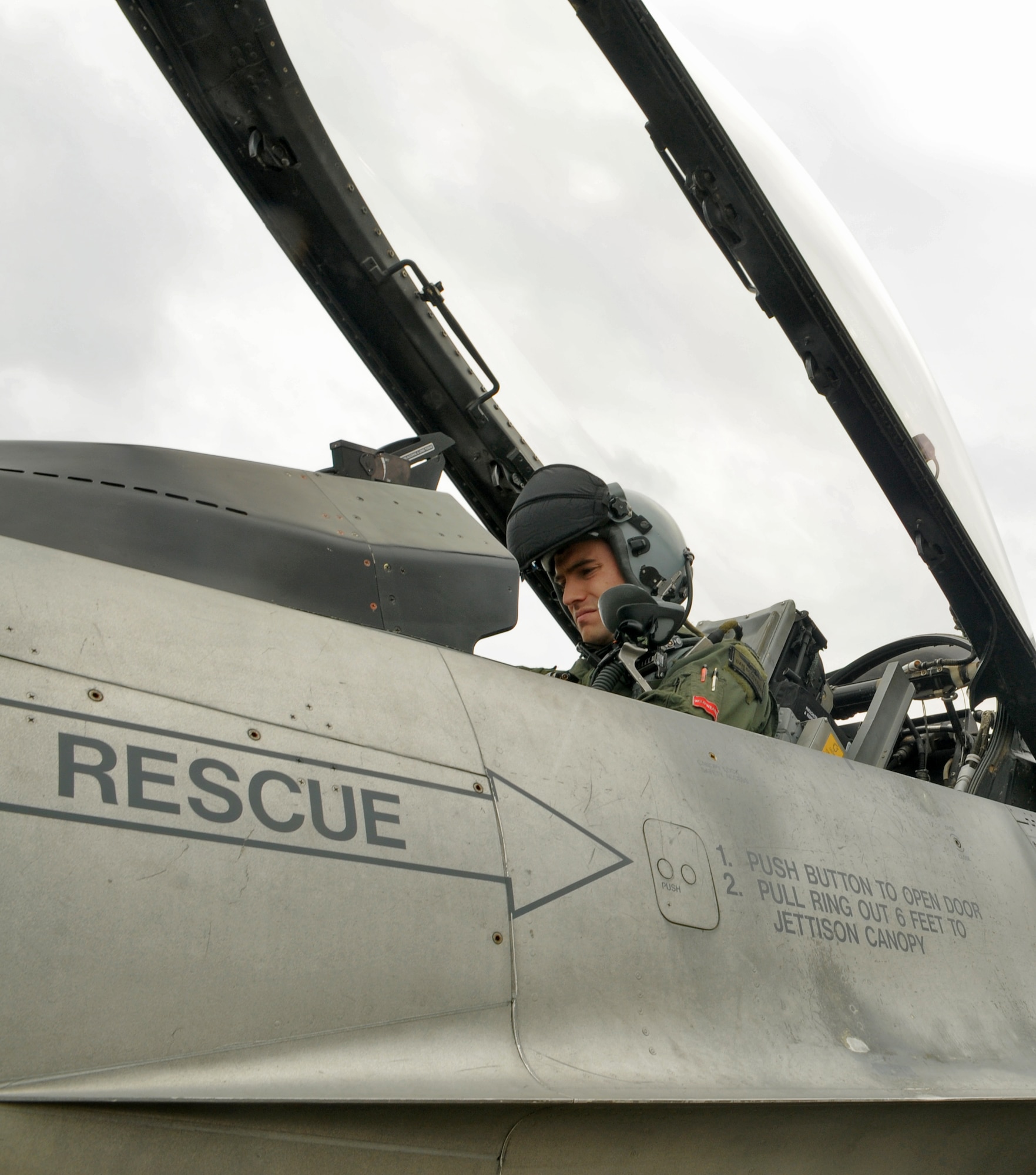 SPANGDAHLEM AIR BASE, Germany – Capt. Leroy Schreiber, 22nd Fighter Squadron F-16 Fighting Falcon fighter pilot, accomplishes pre-flight checks on an F-16 prior to takeoff in preparation for an Allied Strike mission Aug. 4. Allied Strike is an annual close air support exercise, providing realistic training for US and NATO participants in all aspects of tactical air control and CAS. (U.S. Air Force photo/Senior Airman Nick Wilson)