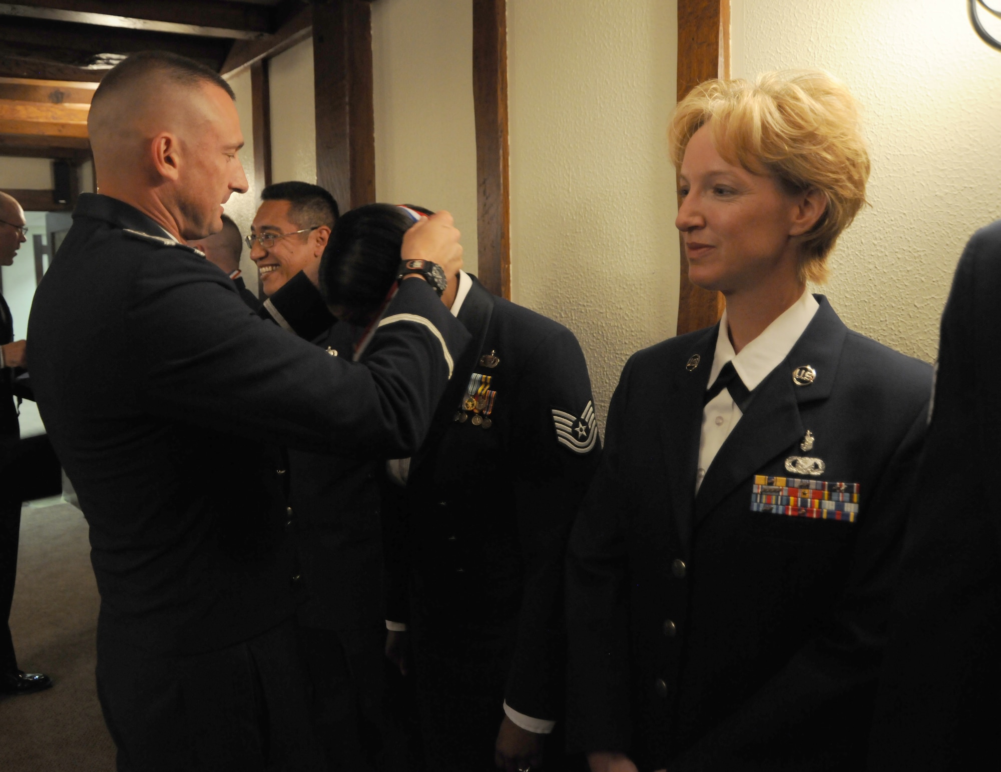 RAF ALCONBURY, United Kingdom - Col Timothy Cashdollar, 501st Combat Support Wing commander, recognizes the graduates of the 2010 Senior NCO Course before their induction ceremony July 30. (U.S. Air Force Photo by Staff Sgt. Joel Mease)