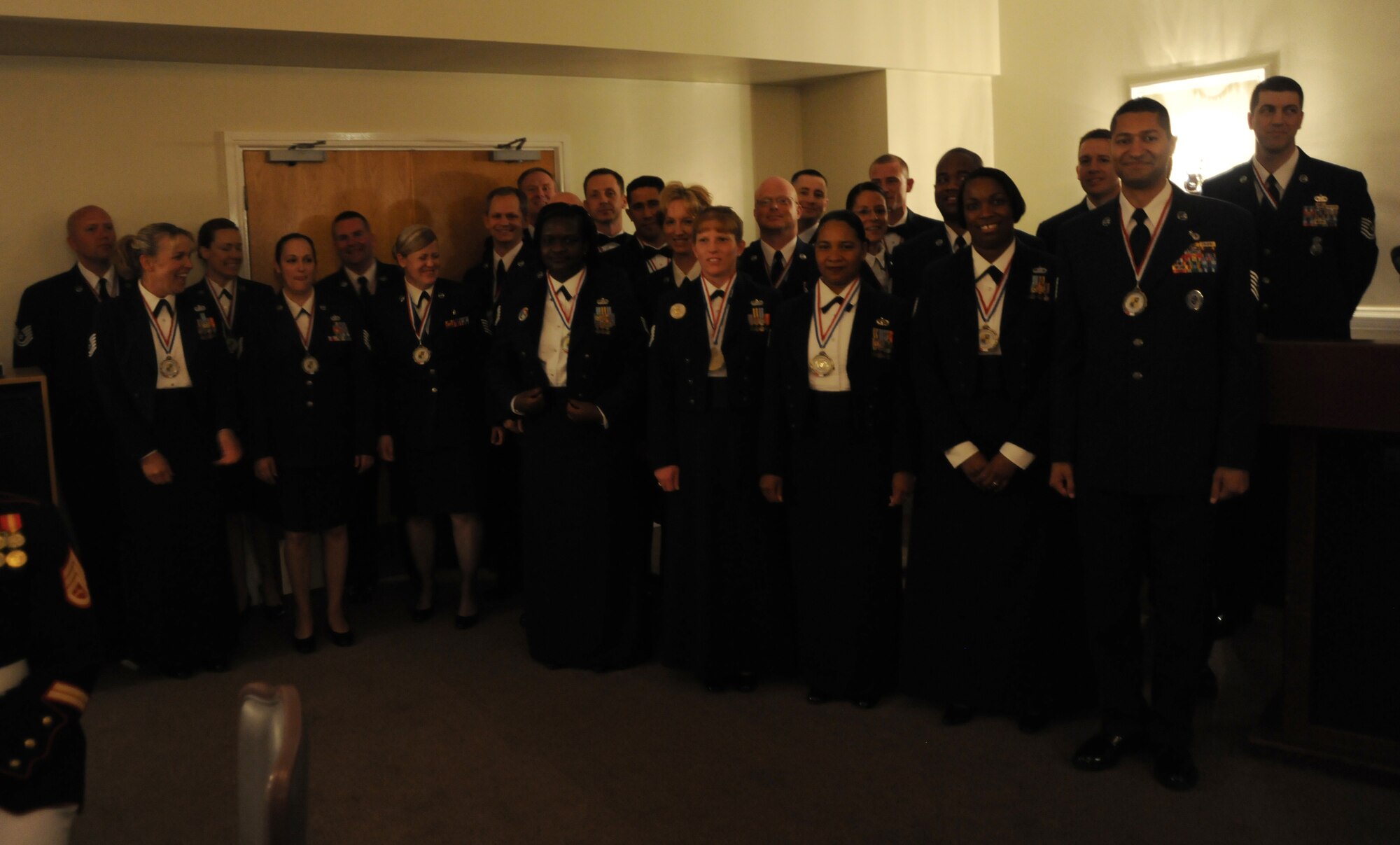 RAF ALCONBURY, United Kingdom - Airmen from the 2010 Senior NCO Induction Course are recognized for their achievement during a ceremony July 30 here. (U.S. Air Force Photo by Staff Sgt. Joel Mease)