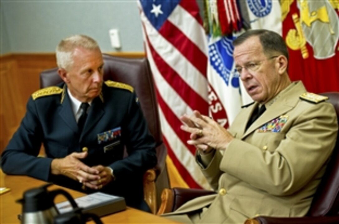 U.S. Navy Adm. Mike Mullen, chairman of the Joint Chiefs of Staff, and Gen. Sverker Goranson, supreme commander of the Swedish Armed Forces, meet in "The Tank," the Joint Chiefs of Staff secure conference room at the Pentagon, Aug. 5, 2010.







