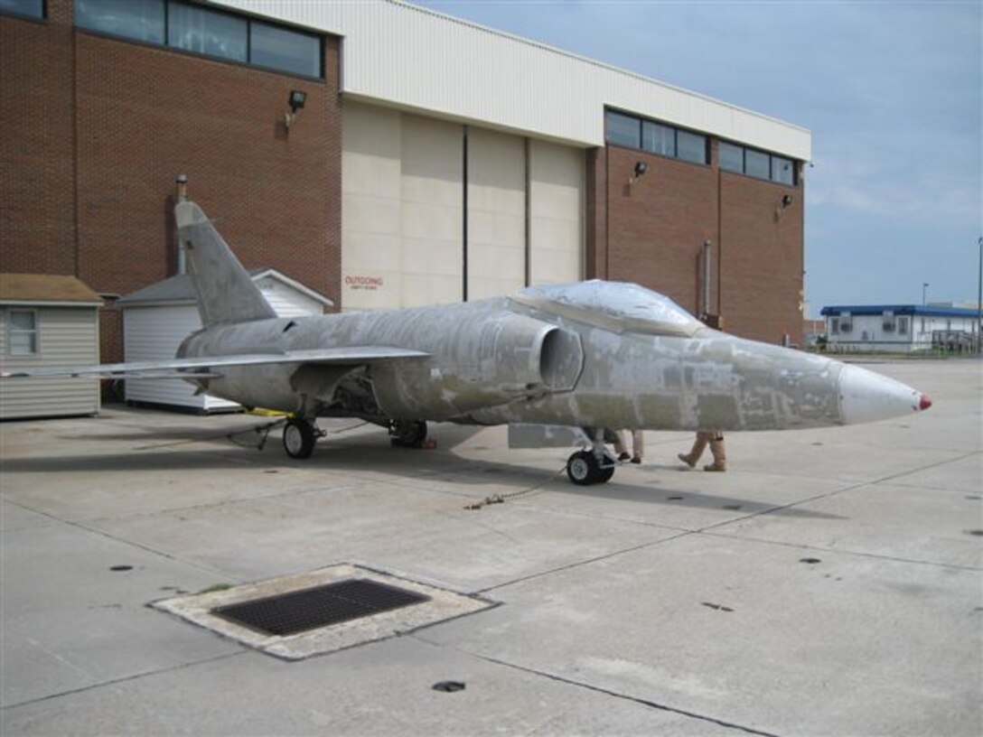 After years of neglect while displayed in downtown New Bern, N.C., a decommissioned F-11 fighter aircraft came to Cherry Point in July to undergo an approximate five-month facelift.::r::::n::The aircraft has been on loan from the National Museum of Naval Aviation in Pensacola, Fla. since the 1970s. In prime condition, it perched on Martin Luther King Boulevard as a symbol of the city’s close relationship with the military.::r::::n::Restoring the F-11 back to its flashy Blue Angel form took a combined effort of members from Fleet Readiness Center-East and Marine Aircraft Group 14, explained Lt. Col. Michael J. Perez, MAG-14 operations officer.::r::::n::The aircraft is slated to be placed back in New Bern in the near future on a new pedestal at Lawson Creek Park.::r::::n::