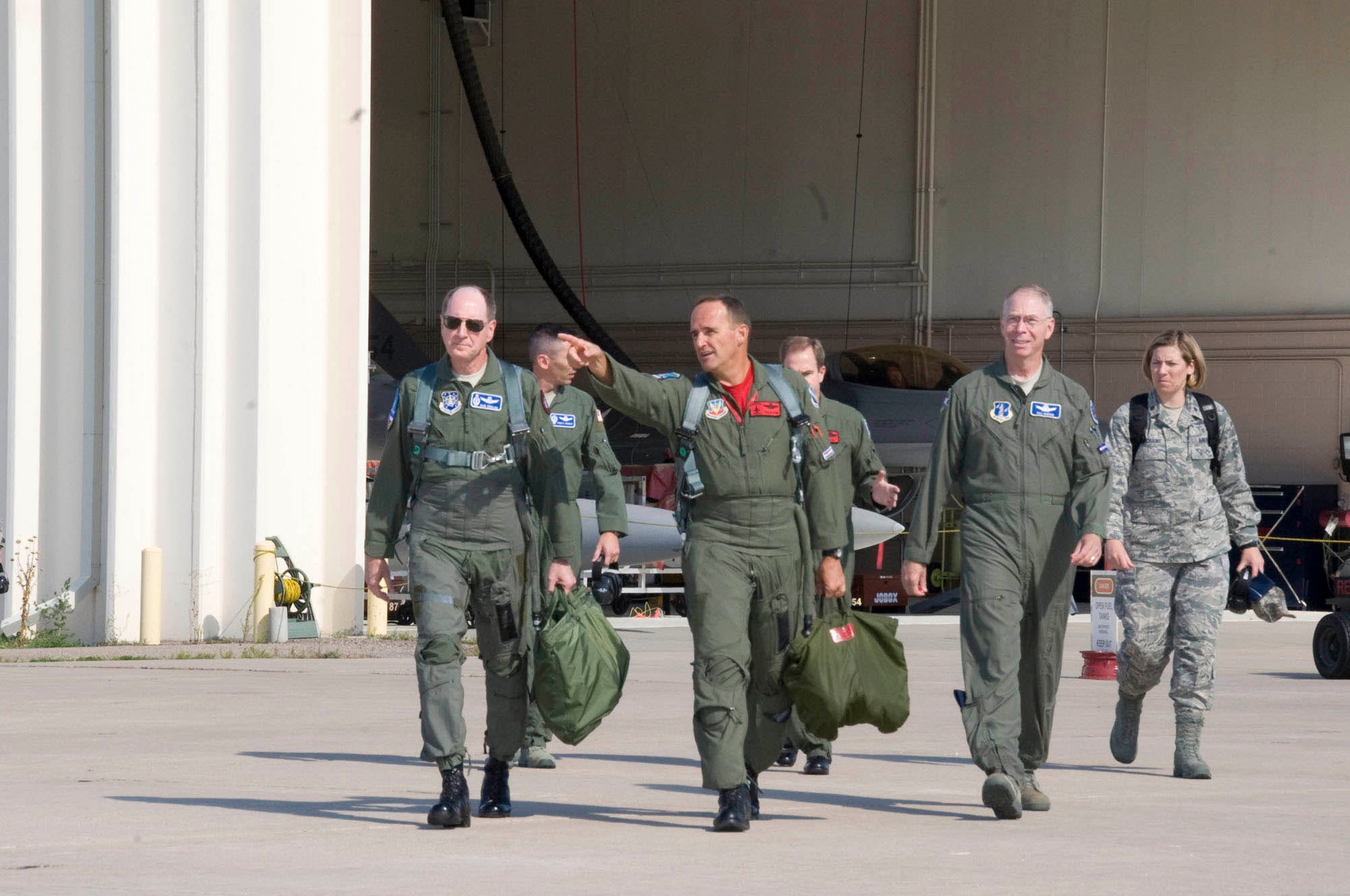 BUCKLEY AIR FORCE BASE, Colo. -- Gen. C. Robert Kehler, commander of Air Force Space Command and Brig. Gen. Trulan A. Eyre, 140th Wing Commander, step to an F-16 prior to takeoff.  Gen. Kehler spent the day learning about the missions of the Colorado Air National Guard as well as spending time with Airmen from the
460th Space Wing at Buckley Air Force Base. (U.S. Air Force photo)
