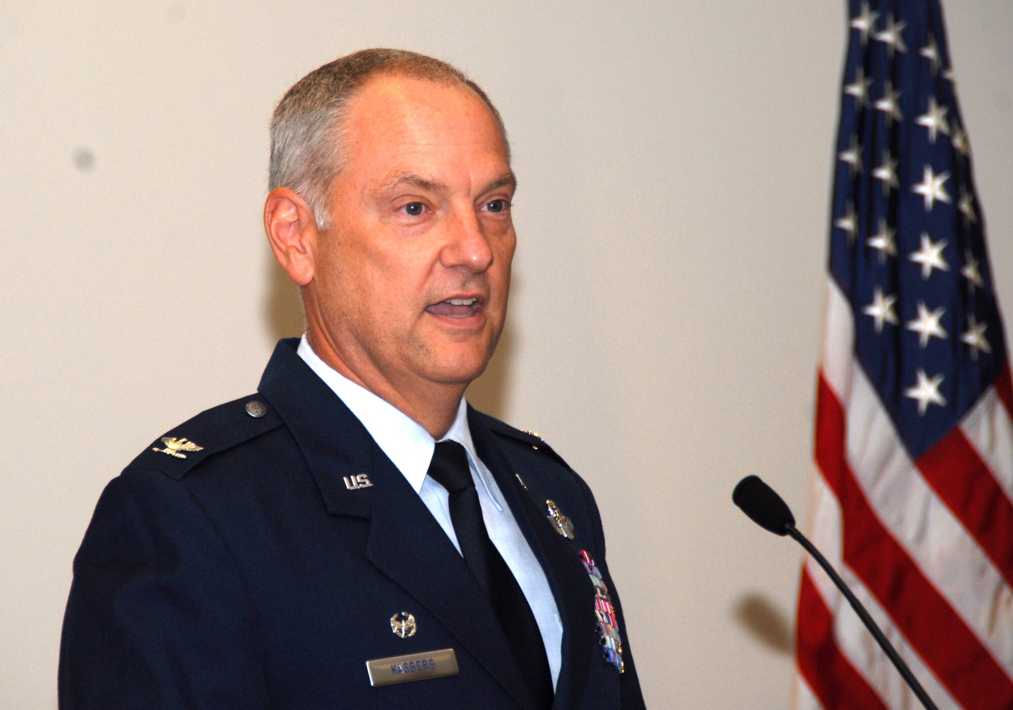 Col. David A. Kasberg, 19th Operations Group commander, speaks about the importance of the partnership between Air Force components in the Total Force Initiative during the reactivation of the 345th Airlift Squadron at Keesler Air Force Base, Miss. Aug. 6. The 345th was reactivated making it the third Active Associate squadron assigned to the 19th Airlift Wing, Little Rock Air Force Base, Ark., and the first ever C-130J Total Force Initiative squadron. (U.S. Air Force photo by Capt. Joe Knable)