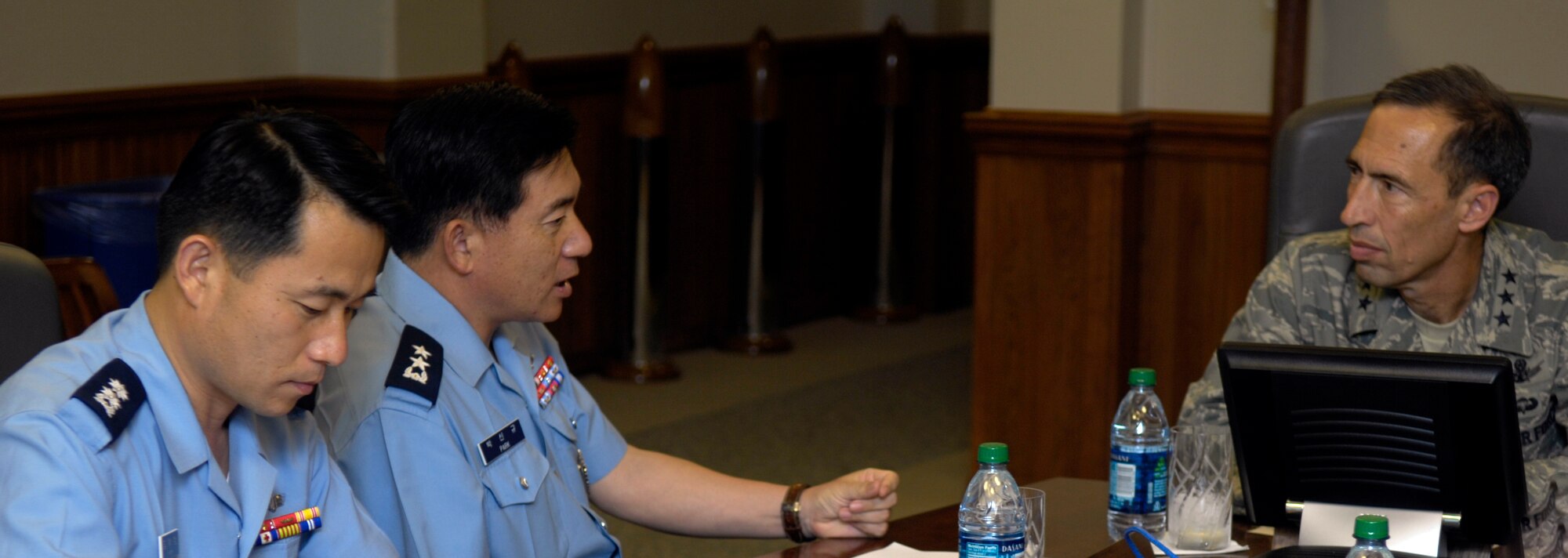 VANDENBERG AIR FORCE BASE, Calif. – After a tour of Space Launch Complex-6, Korean Air Force Maj. Gen. Sin-Kyu Park, and his interpreter Korean Air Force Lt. Col. Hak Chang Kim, meet at Joint Functional Component Command for Space facility for a briefing to discuss the policies and functions of the JFCC Space here Thursday, Aug. 5, 2010. (U.S. Air Force photo/Airman 1st Class Lael Huss)