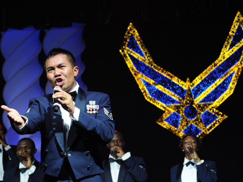 ABILENE, Texas -- Staff Sgt. Harron Elloso, Tops in Blue vocalist, sings a solo during the free show at the Abilene Civic Center Aug. 2. Tops in Blue is one of the oldest and widely traveled entertainment groups of its kind, composed of 35 to 40 vocalists, musicians, dancers and technicians who perform free shows for military, their families and civilians throughout the world. The 2010 tour is a salute to the ideals we believe in as Americans and features the music of Stevie Wonder, Michael Buble, Montgomery Gentry, Lady Gaga, The Black Eyed Peas and more. The team is an all-active duty U.S. Air Force special unit made up of talented performers selected for their entertainment abilities. Since its first world tour in 1953, the group has also performed on film, produced albums and appeared on national television with such legends as Ed Sullivan and Bob Hope. (U.S. Air Force photo/ Senior Airman Jenifer H. Calhoun)