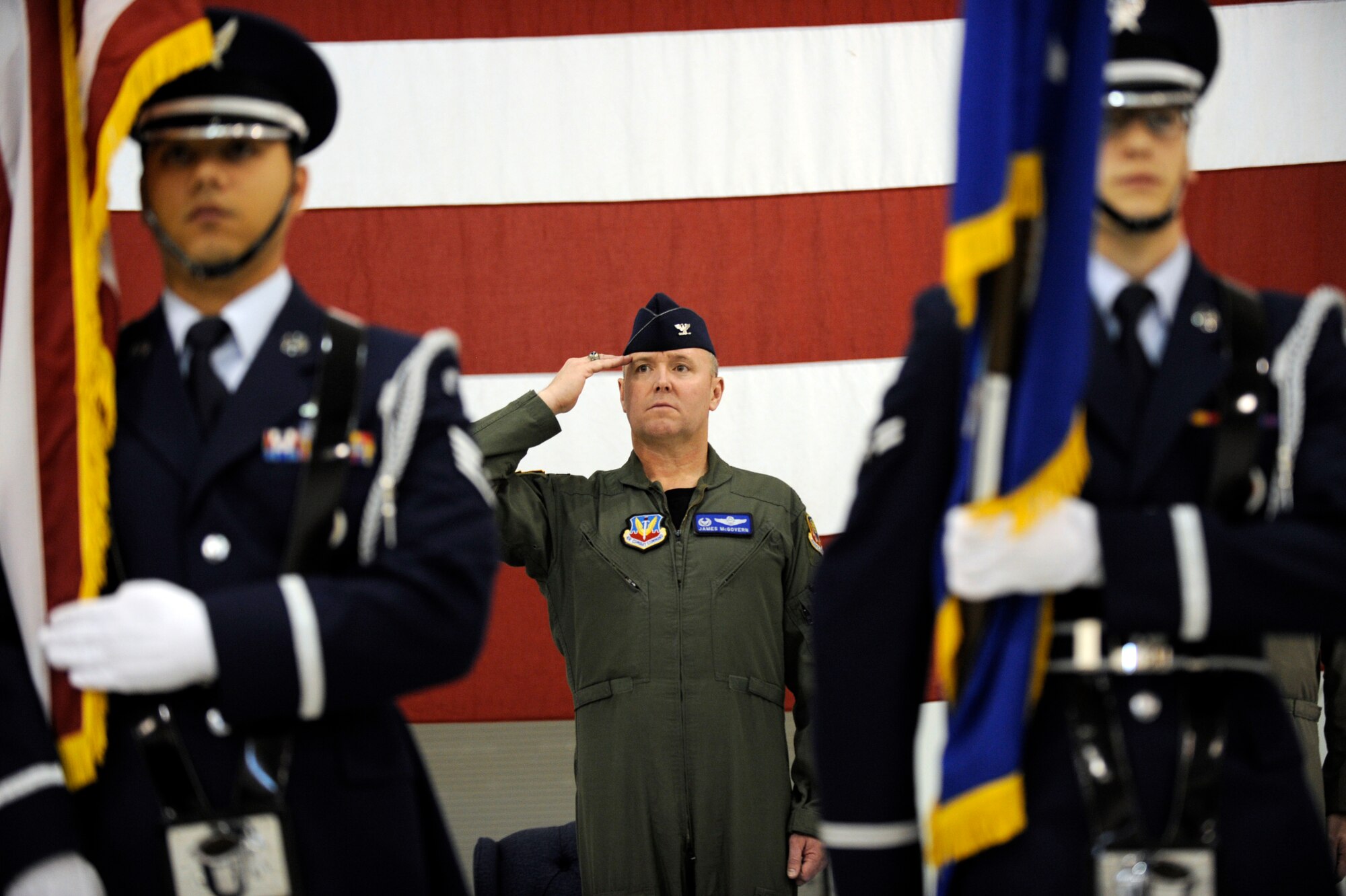 MOUNTAIN HOME AIR FORCE BASE, Idaho - 366th Operations Group commander Col. James McGovern  salutes during his change of command ceremony held in hangar 1331 June 16. Col. Kyle Robinson took over command of the OG in a tearful welcome and farewell ceremony. (U.S. Air Force photo by Airman 1st Class Renishia Richardson)