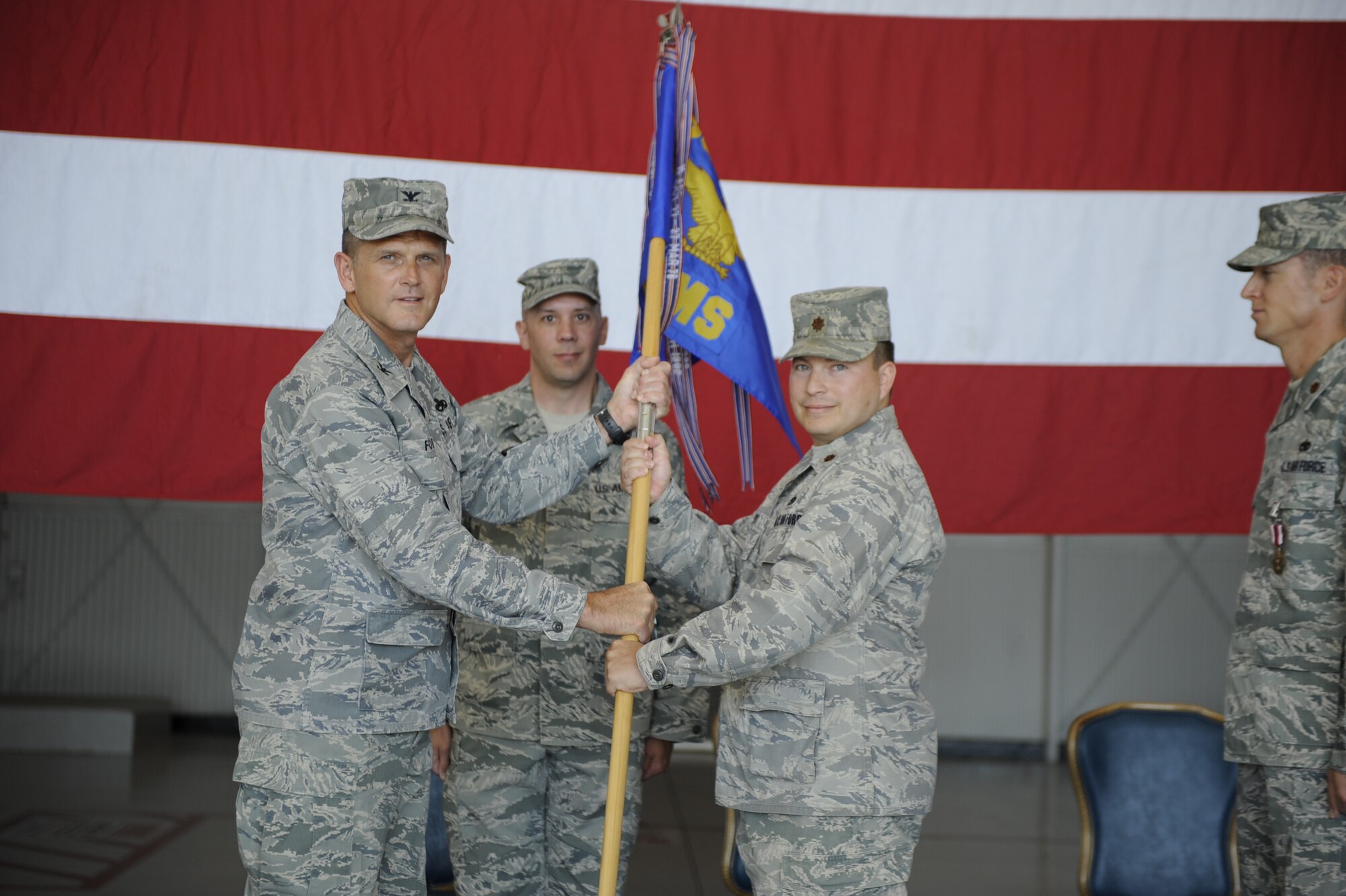 MOUNTAIN HOME AIR FORCE BASE, Idaho - Maj. Peter Soto assumes command of the 366th Component Maintenance Squadron during a change of command ceremony held in hangar 1331 July 16. Col. James Fowler presided over the ceremony. (U.S. Air Force photo by Airman 1st Class Renishia Richardson)