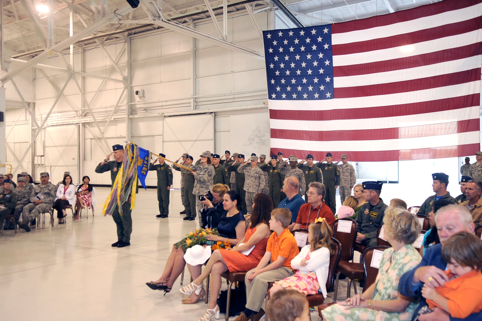 MOUNTAIN HOME AIR FORCE BASE, Idaho - Incoming commander Lt.Col. Brian McCarthy receives his first salute from the 391st Fighter Squadron June 4. The change of command was presided over by Col. James McGovern. (U.S. Air Force photo by Airman 1st Class Angelina Drake)