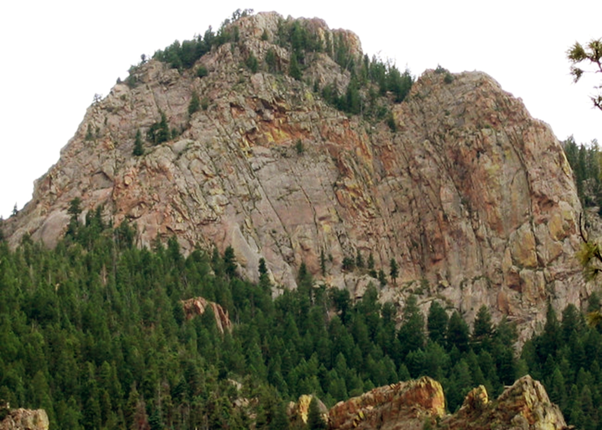 Eagles Peak, a mountain west of the U.S. Air Force Academy, Colo., is where Maj. David Garay survived a 50-foot fall while hiking as a cadet in 1997. Although bones were broken in his face, he tried to climb down to get help. The head trauma he suffered almost cost him his dream of flying for the Air Force, but he overcame it all to become a flight test engineer. (Courtesy photo)