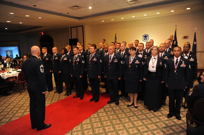 Thirty-five technical sergeants were welcomed by friends and family into the senior noncommissioned officer tier during the Senior NCO Induction Ceremony Aug. 5 at the Charleston Club on Joint Base Charleston, S.C. Within this corps, Airmen transfer from craftsmen and supervisors to senior leadership and managerial positions. This ceremony is held annually to commemorate this milestone in an Airman's career. (U.S. Air Force photo/Senior Airman Timothy Taylor)